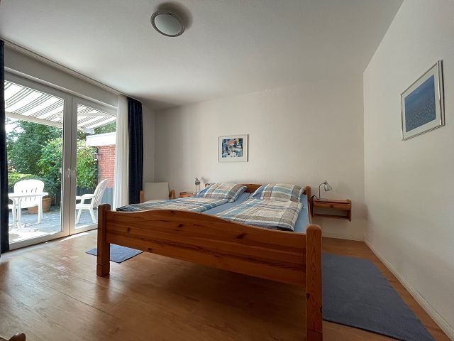 Elternschlafzimmer mit Zugang zur Terrasse