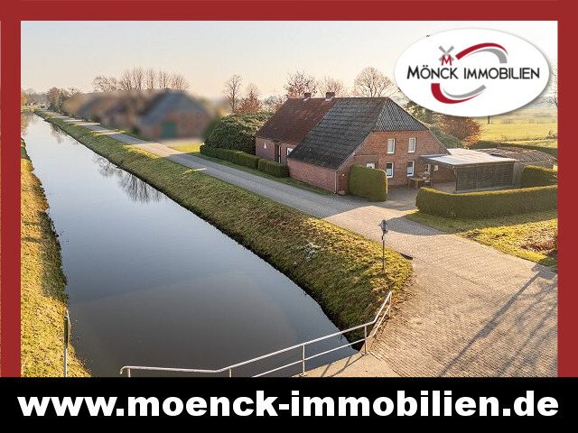 Renovierungsbedürftiges Landhaus am Kanal mit Weideland 