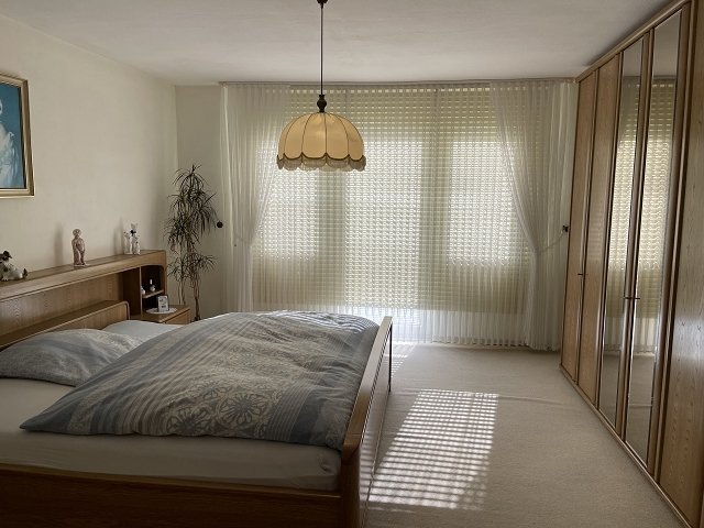 Schlafzimmer mit Balkon